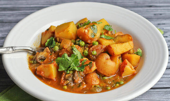 Mushroom Potato and peas curry