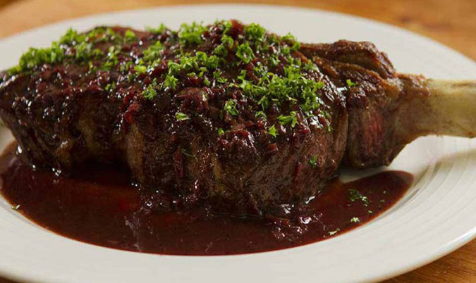 Scotch fillet served with red wine sauce