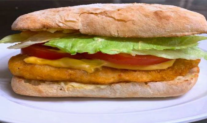 crumbed chicken schnitzel burger