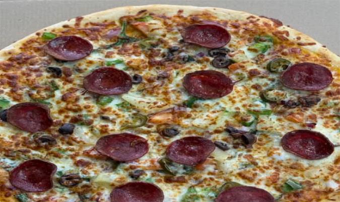 Kikis Deluxe Supreme Pizza