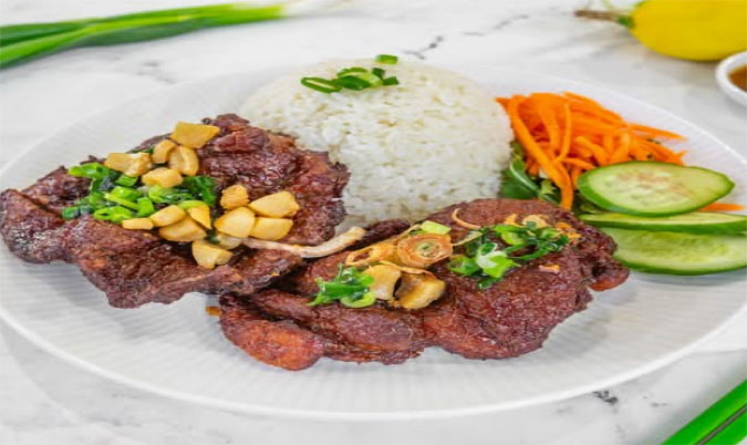 Vietnamese 2  pork chop on rice