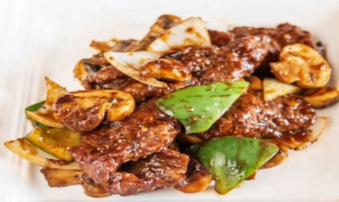 Steak in Black Pepper & Wine Sauce