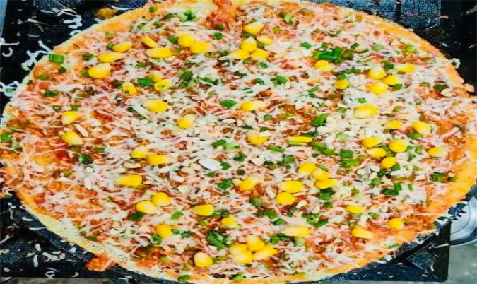Schezwan Cheese Corn Dosa