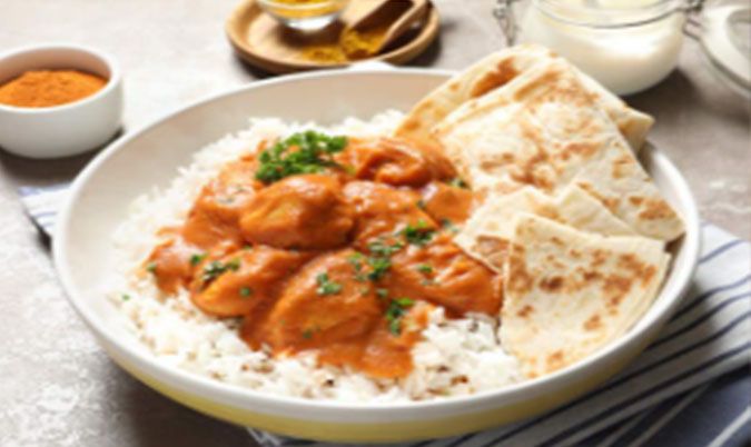 Butter Chicken Curry served with Naan, Rice & a Drink
