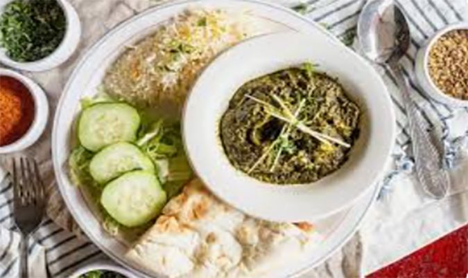 Any 1 Half Curry + Rice + Naan or Garlic Naan