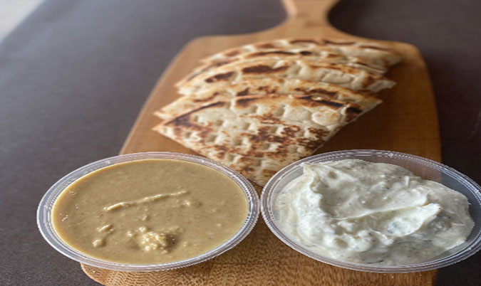 Home made taziki with 2 pc toasted pita bread