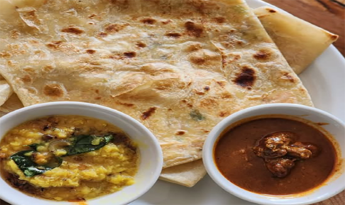 2 Egg roti with Dhal & Chicken curry